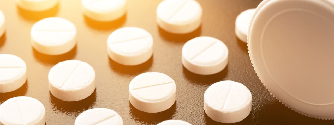 Adderall pills laid out on a surface